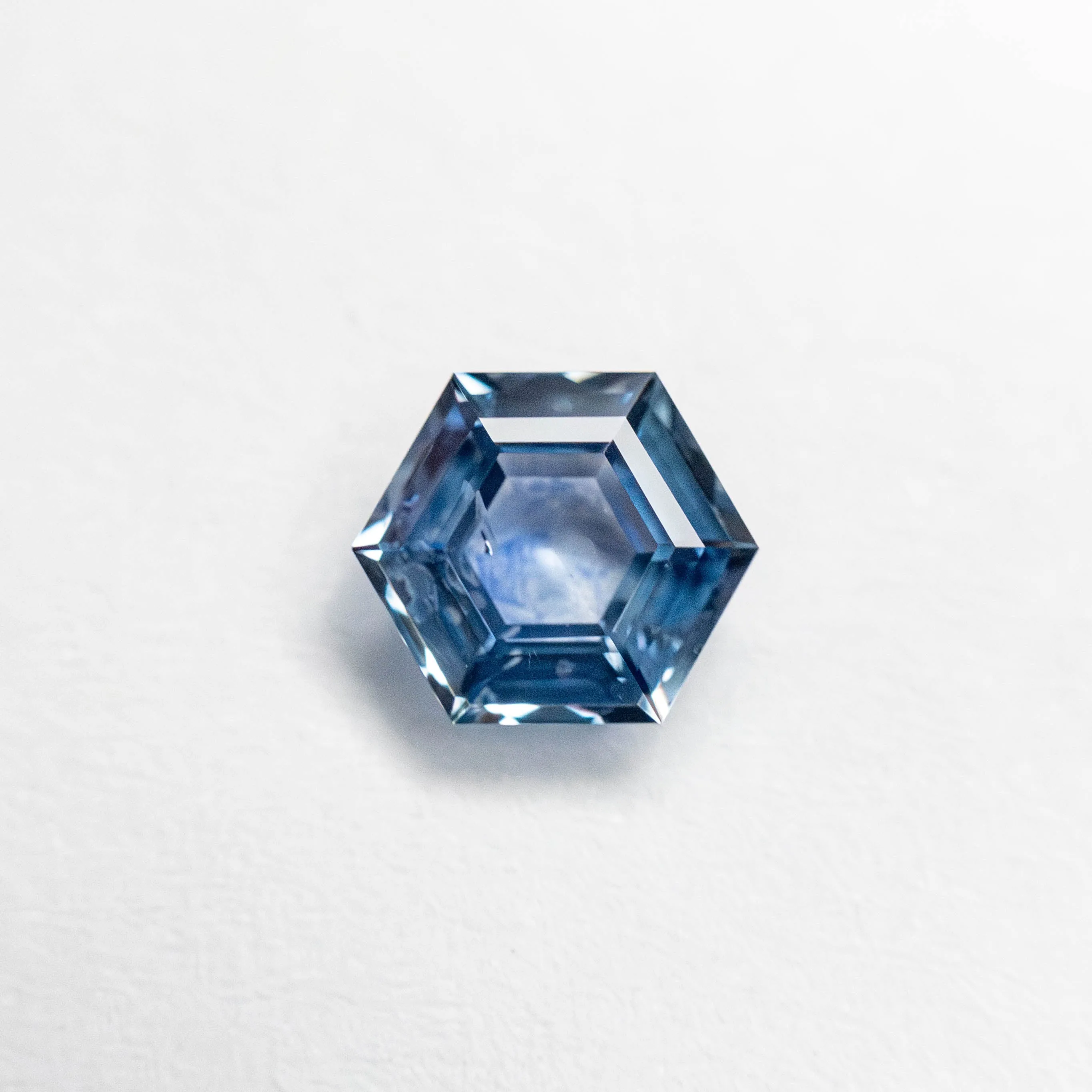 0.61ct 5.69x4.94x2.46mm Hexagon Step Cut Sapphire 23088-17